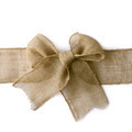 Photo Of Close Up Of Christmas Present Wrapped In Brown Paper With Pine